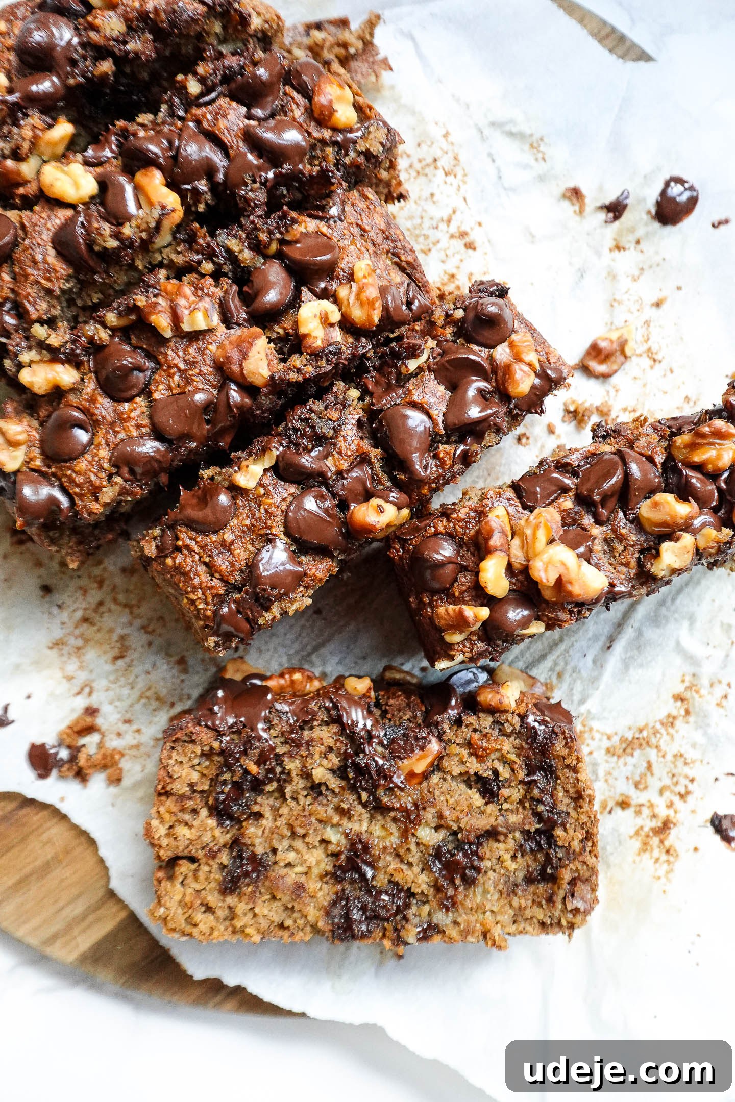 Ultimate Healthy Vegan and Gluten Free Banana Bread 2 The best vegan and gluten-free banana bread, perfectly sliced to show its moist texture and delicious chocolate chips.