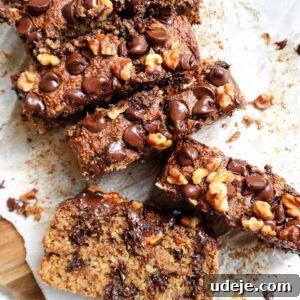 Ultimate Healthy Vegan and Gluten Free Banana Bread 12 A slice of healthy vegan and gluten-free banana bread with a bite taken out.