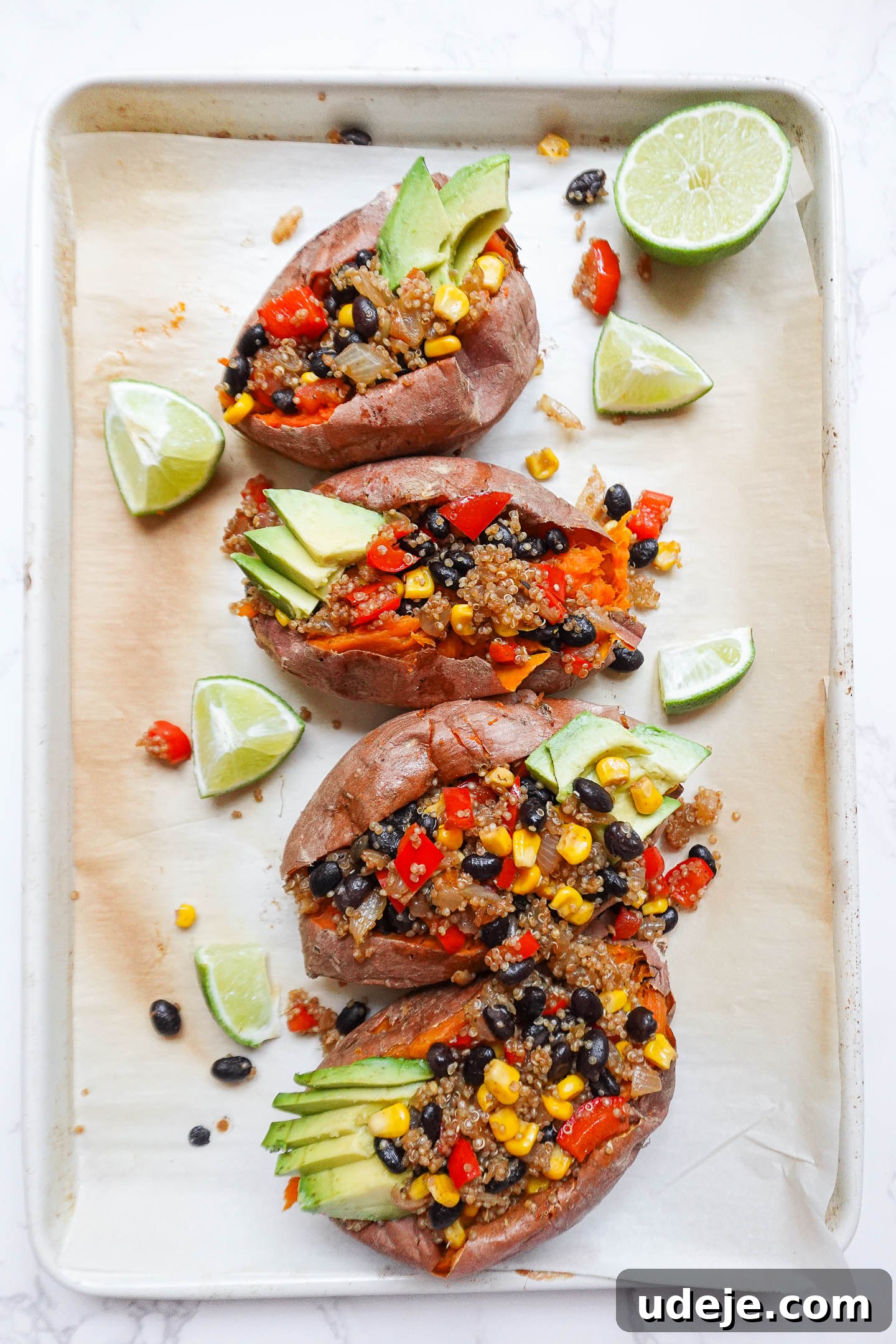 Fully stuffed sweet potatoes with creamy avocado and fresh lime.