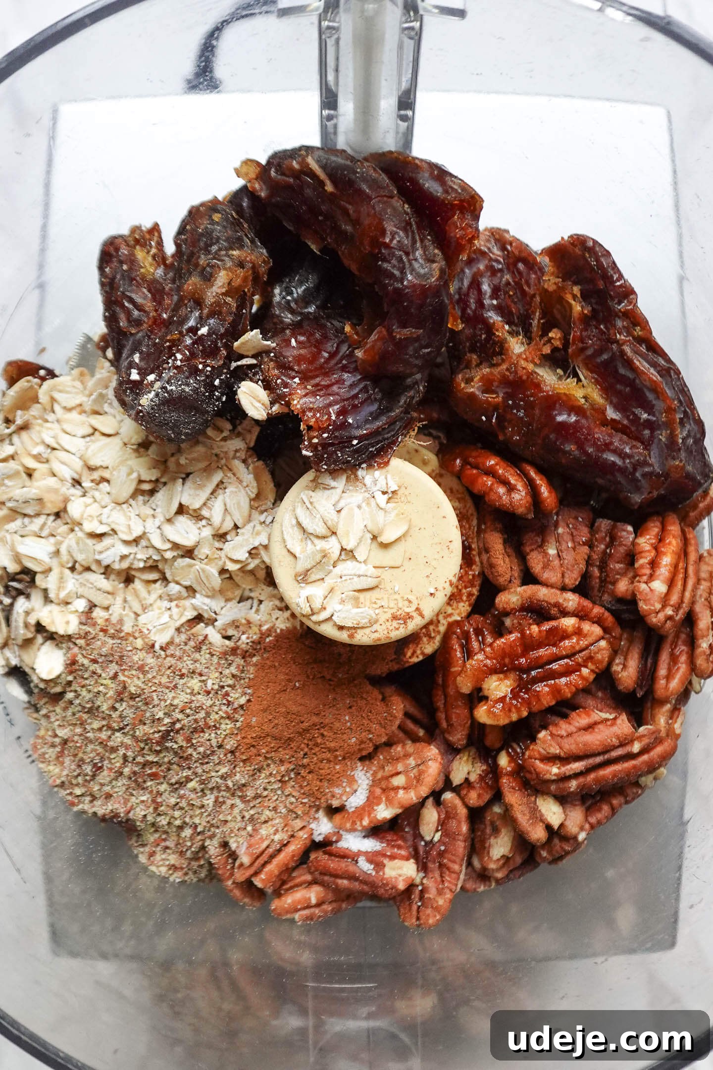 Pecan Pie Power Bites 5 Top view of ingredients in a food processor, showing the first step of making energy balls.