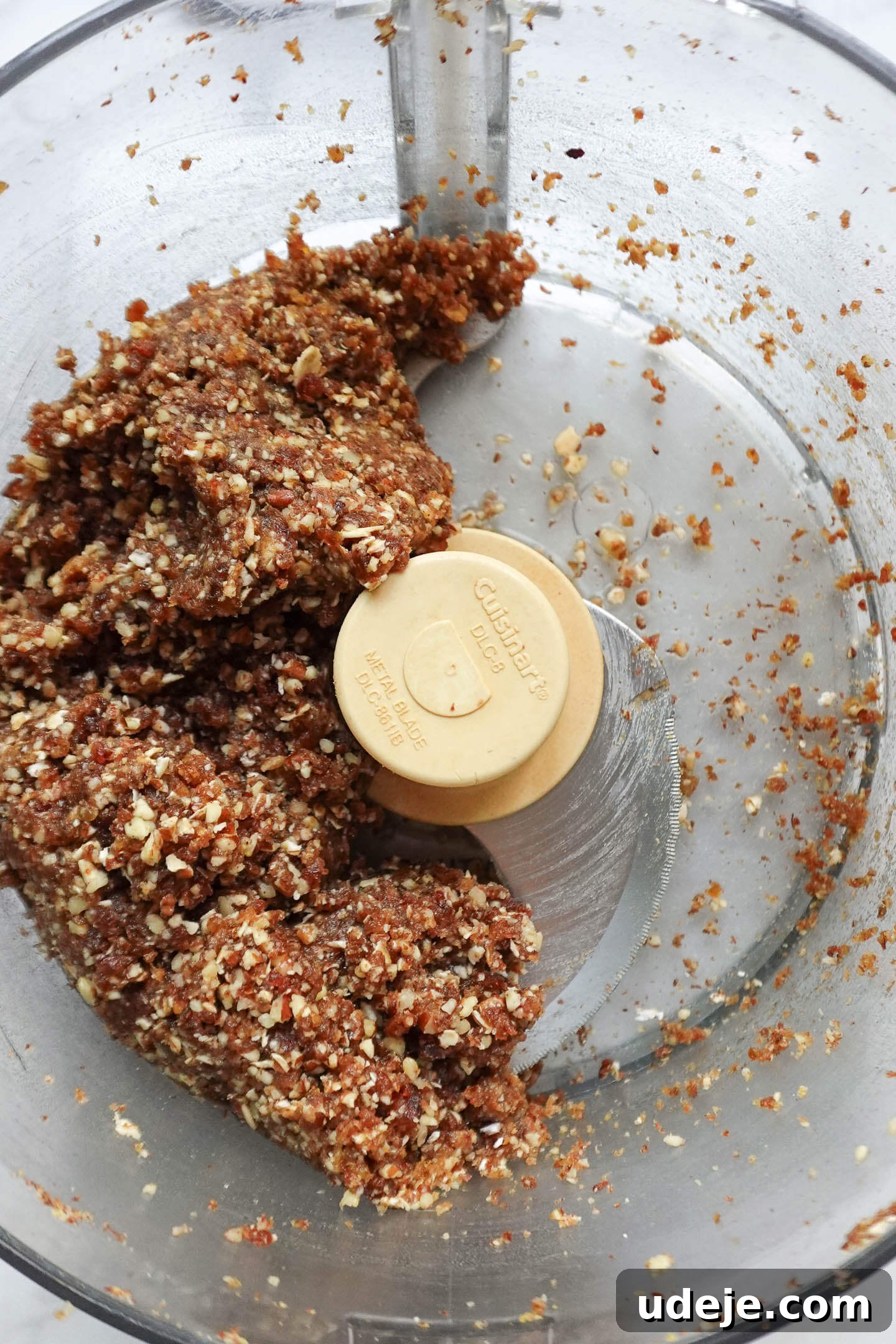 Pecan Pie Power Bites 6 Ingredients for Pecan Pie Energy Balls blending together in a food processor.