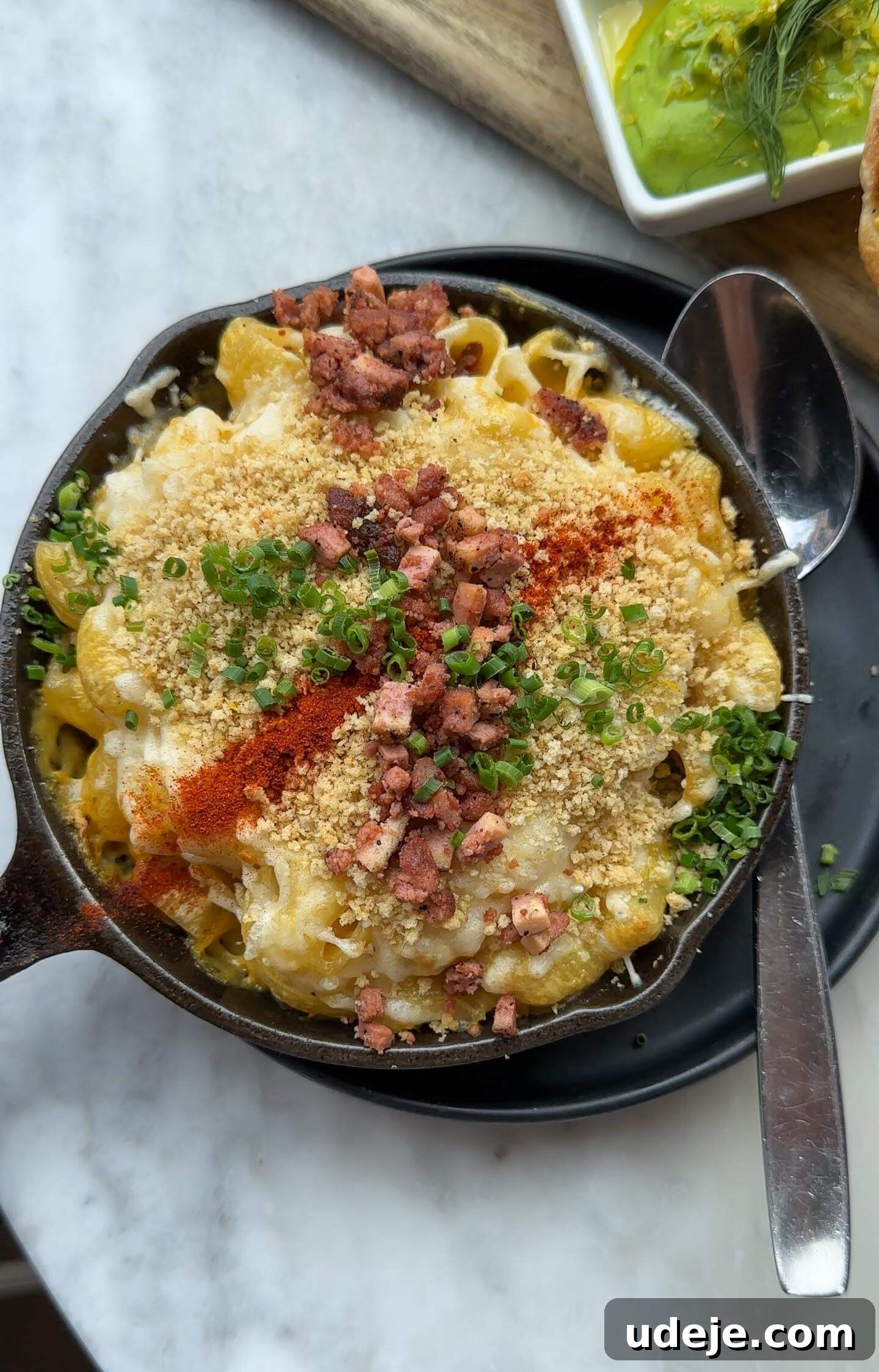 The Ultimate New York City Vegan Restaurant and Cafe Guide 7 Vegan mac & cheese topped with vegan bacon and truffle oil at Willow, a cozy vegan comfort food restaurant in NYC.