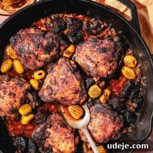 Golden Crispy Moroccan Oven Chicken 16 Moroccan Chicken in a large cast iron pan