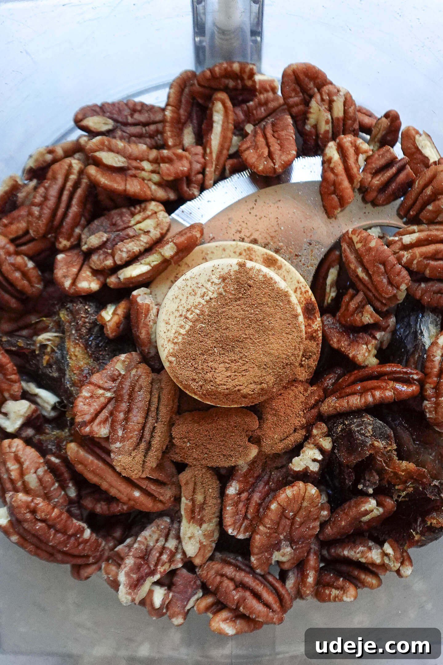 Effortless Vegan Pumpkin Cheesecake Trifle 3 Blending pecans and medjool dates for the pecan-date crumble in a food processor