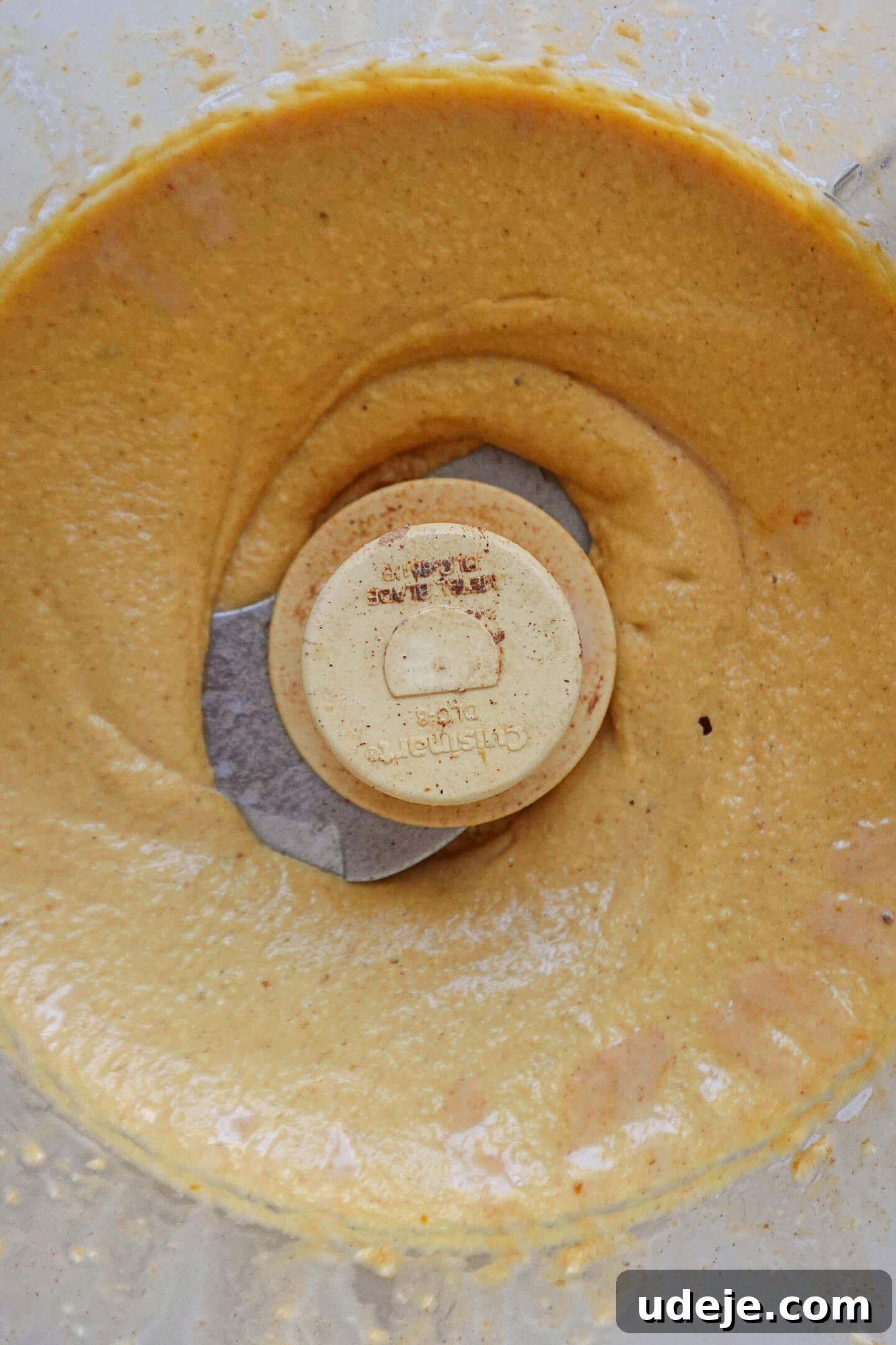 Effortless Vegan Pumpkin Cheesecake Trifle 5 Preparing creamy vegan pumpkin cheesecake filling with cashews and pumpkin puree