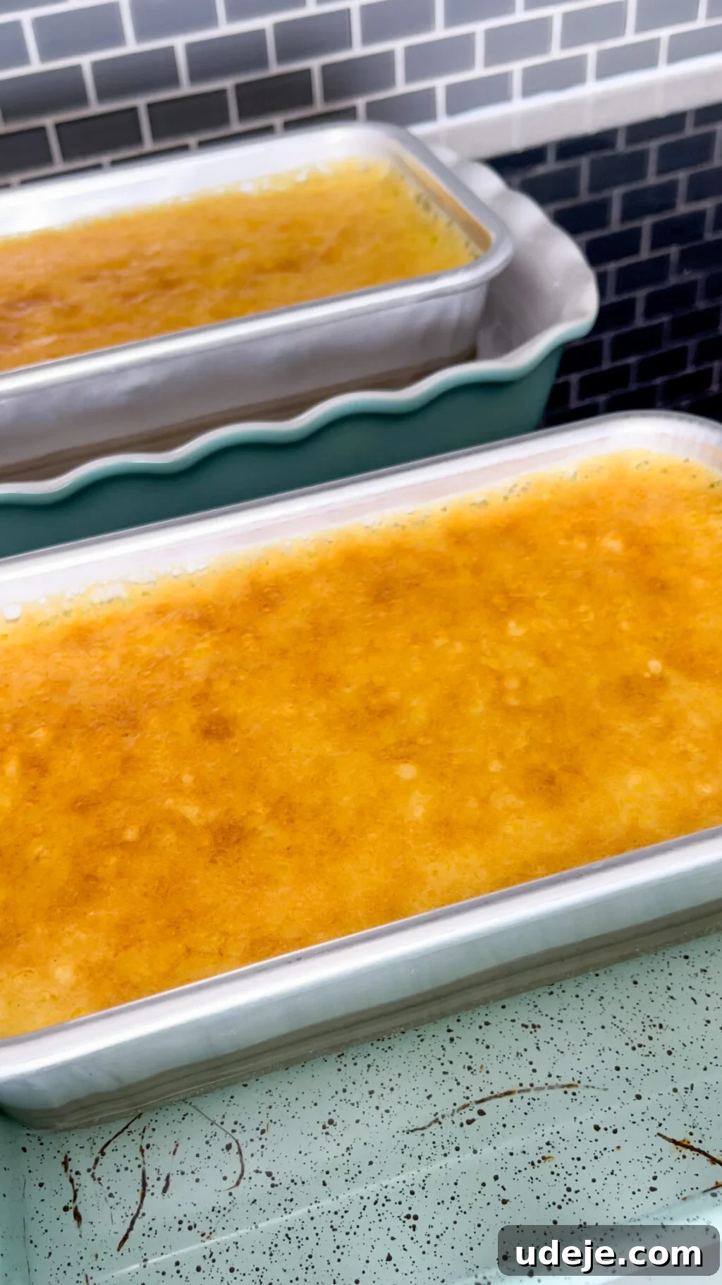 Creamy Condensed Milk Creme Caramel 17 2 baked creme caramels in loaf tins in mint coloured baking dishes