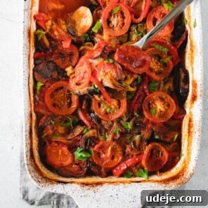 Mediterranean Eggplant Casserole served in a baking dish with distinct layers
