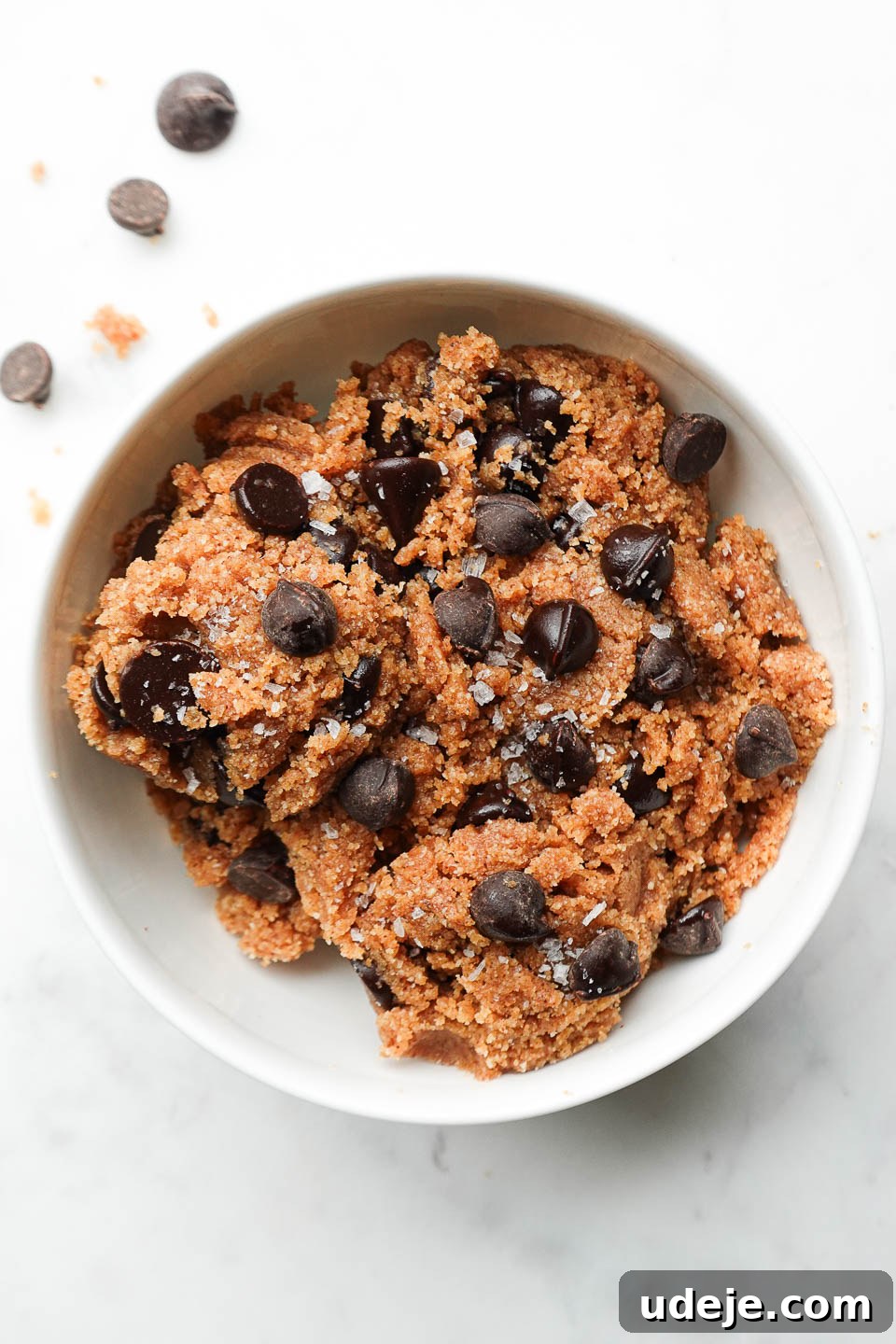 Guilt-Free Vegan Gluten Free Cookie Dough 3 Healthy edible cookie dough made with almond flour, almond butter, and chocolate chips in a bowl.