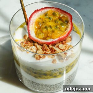 Tropical Passionfruit Chia Pudding 4 Jar of passionfruit chia pudding with half a passionfruit on top