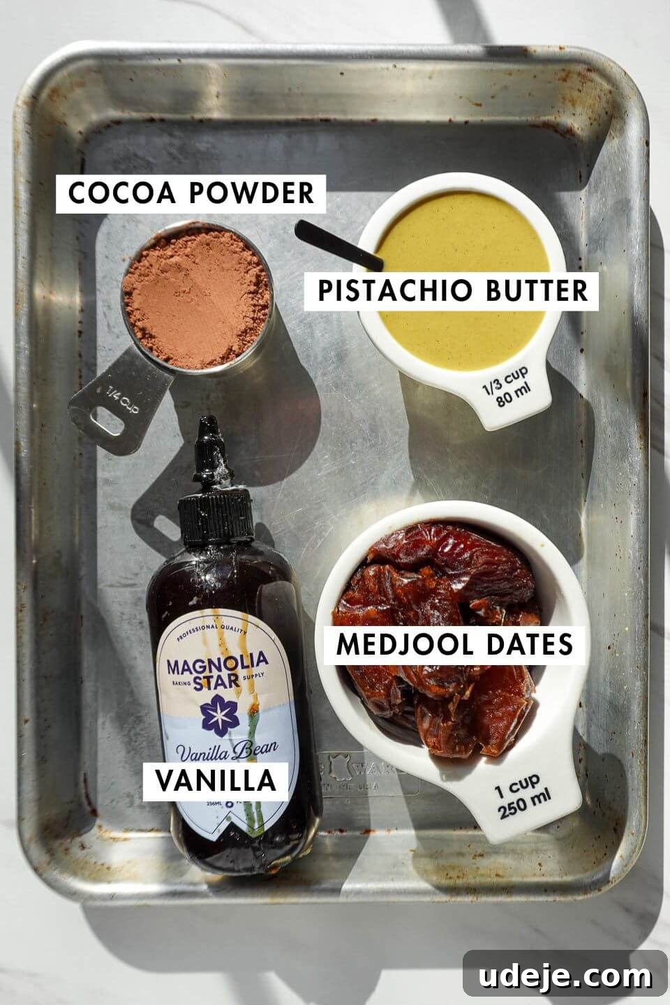 Effortless No Bake Pistachio Brownies Vegan Gluten-Free Small Batch 6 ingredients needed to make pistachio brownies including medjool dates, cocoa powder, pistachio butter, and vanilla extract