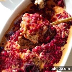 Close-up of peanut butter and jelly overnight oats with creamy texture, ready to eat.
