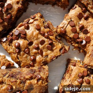 Vegan Gluten Free Chocolate Chip Banana Dream Bars 12 Overhead shot of soft and moist vegan chocolate chip banana bars with mini chocolate chips, presented beautifully.