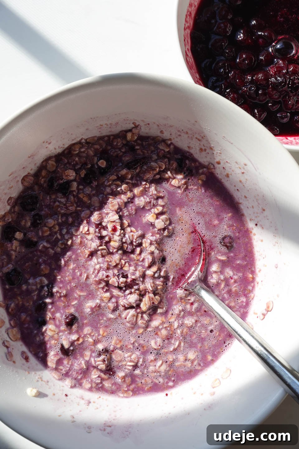 Blueberry Muffin Bliss Overnight Oats 9 vibrant purple color from blueberry overnight oats in a bowl