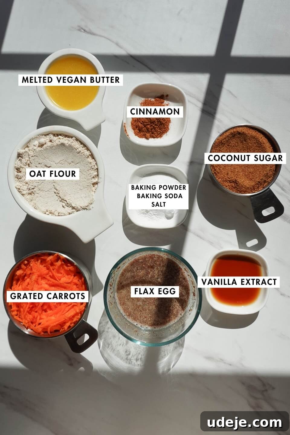 Decadent Spiced Carrot Coffee Cake Vegan Gluten Free 5 Collection of fresh ingredients for vegan carrot cake coffee cake, including oat flour, carrots, coconut sugar, and walnuts.