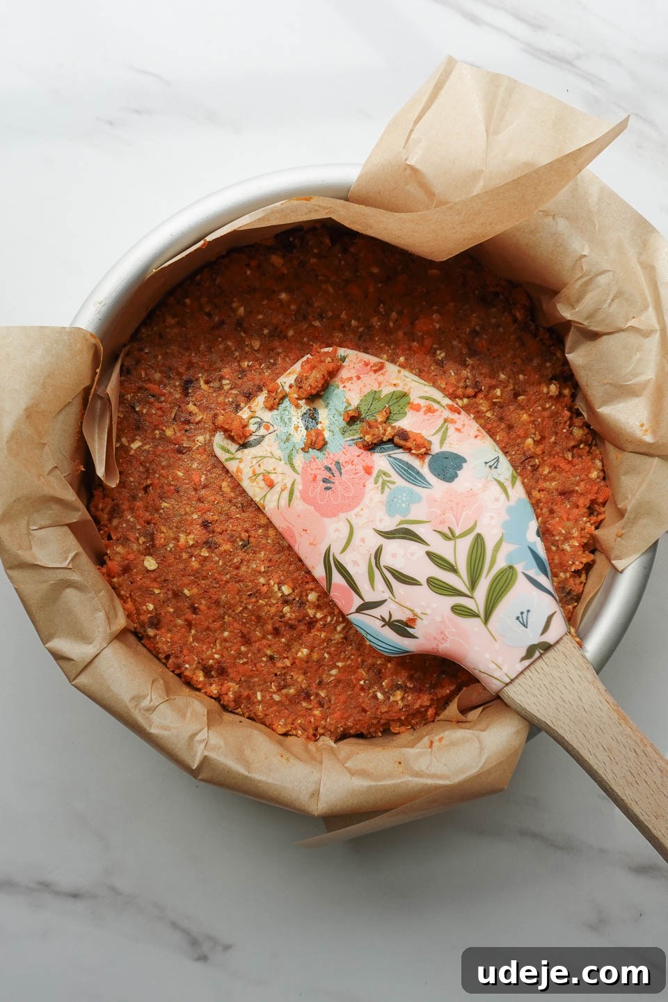 Dreamy No Bake Carrot Cake 12 Pressing no bake carrot cake mixture into lined pan for chilling
