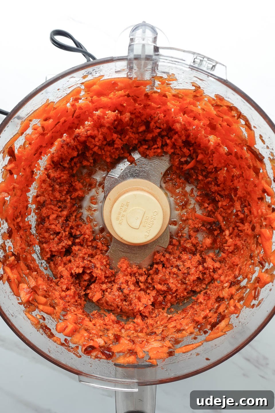 Dreamy No Bake Carrot Cake 9 Finely shredded carrots and blended dates mixture in food processor