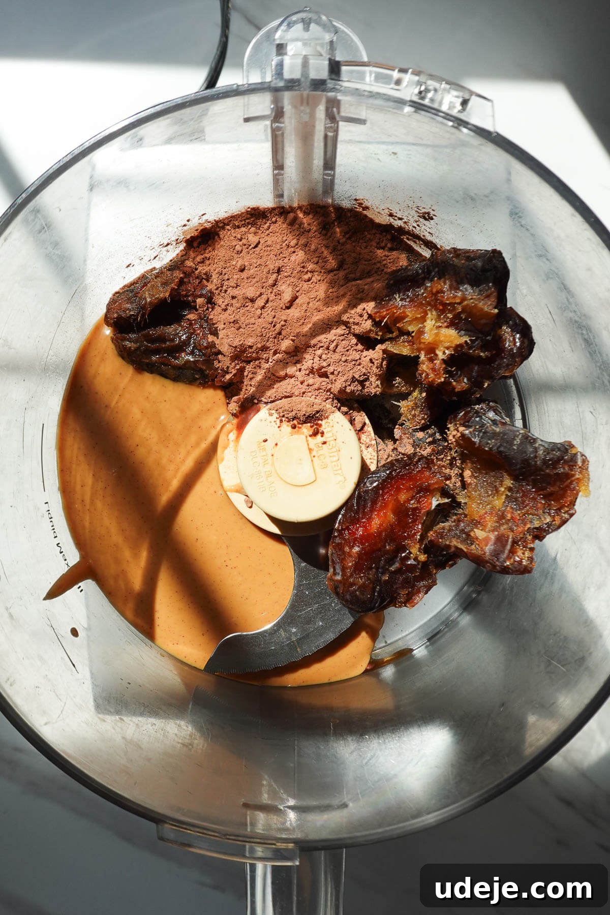 No-Bake Vegan Gluten-Free Cosmic Brownies (Small Batch) 6 Ingredients to make no bake cosmic brownies in a food processor before blending