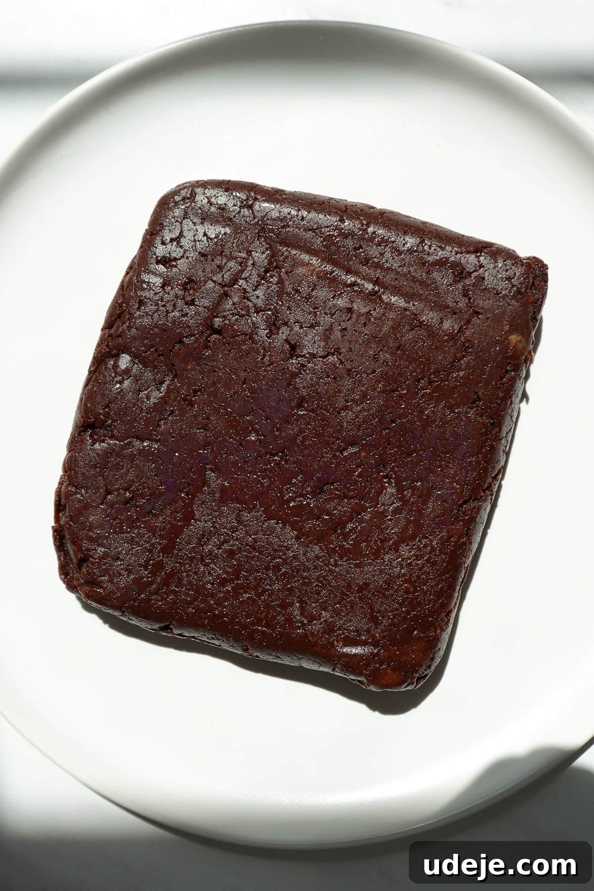No-Bake Vegan Gluten-Free Cosmic Brownies (Small Batch) 7 No bake cosmic brownies on a plate before adding the frosting.