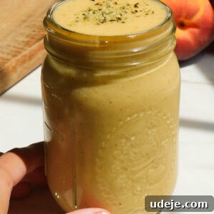 Thick and creamy peach mango smoothie.