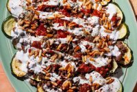 Layered Roasted Zucchini Bake with Ground Beef and Yogurt Tomato Sauce