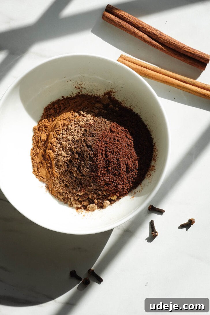 Homemade Pumpkin Pie Spice Blend Recipe 6 Five spices in a bowl to make homemade pumpkin pie spice.